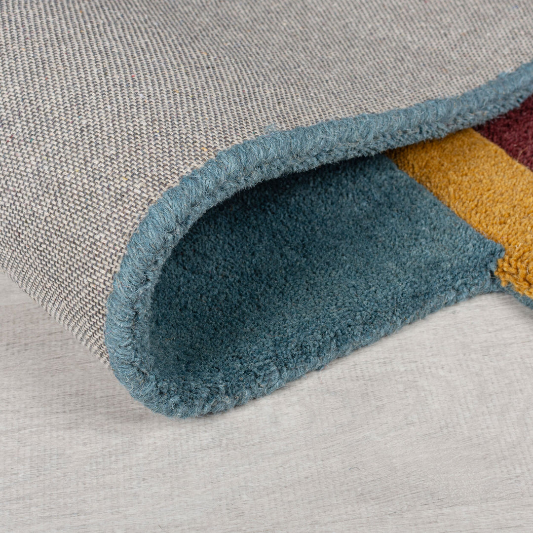 le tapis shuffle est replié sur lui même #couleur_multicolore