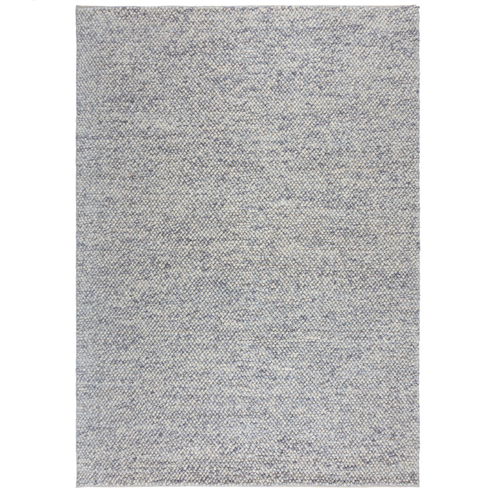 tapis en laine effet bulle de couleur bleu sur fond blanc#couleur_bleu